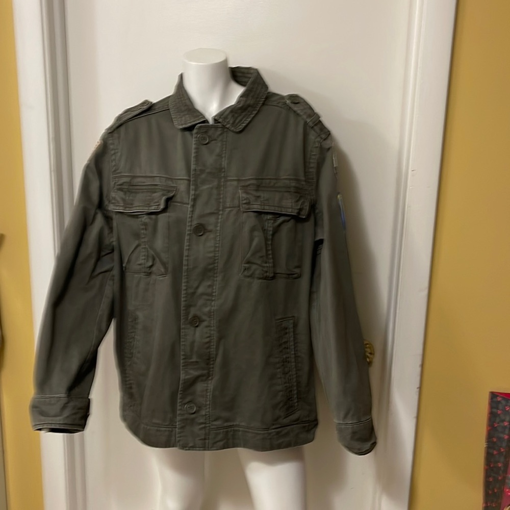 Men’s Arizona jacket with patches, clean no rips or stains.